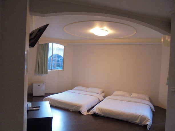 Imagen de la habitación del Hotel Tainan Inn. Foto 10