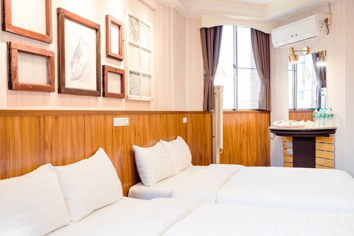 Imagen de la habitación del Hotel Tainan Inn. Foto 17