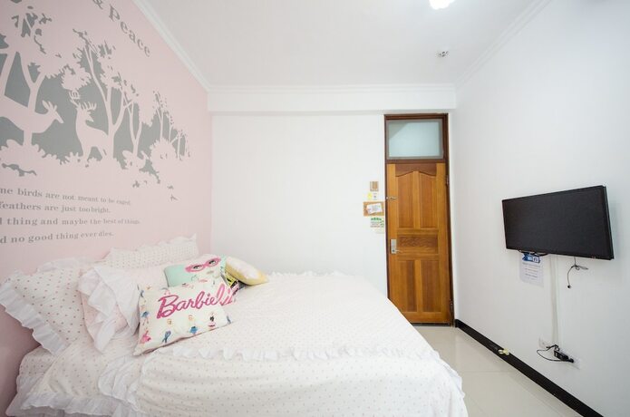 Imagen de la habitación del Hotel Tainan Travel Inn - Chenggong Univ.. Foto 19