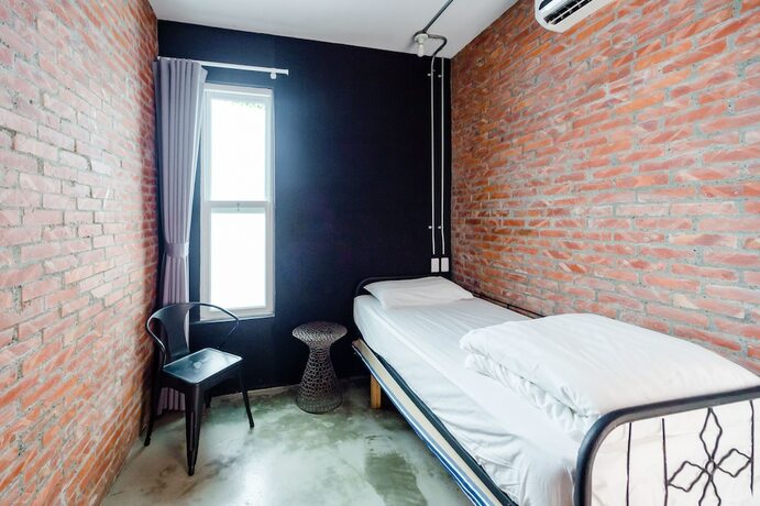 Imagen de la habitación del Hotel Tainan Weshare. Foto 17