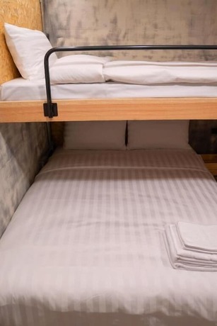 Imagen de la habitación del Hotel Tainanwow. Foto 11
