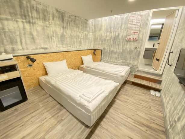 Imagen de la habitación del Hotel Tainanwow. Foto 12