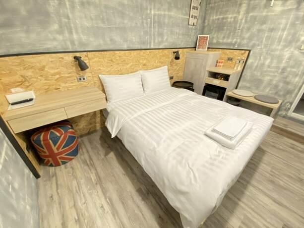 Imagen de la habitación del Hotel Tainanwow. Foto 15