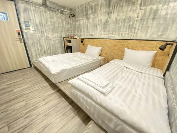 Imagen de la habitación del Hotel Tainanwow. Foto 19