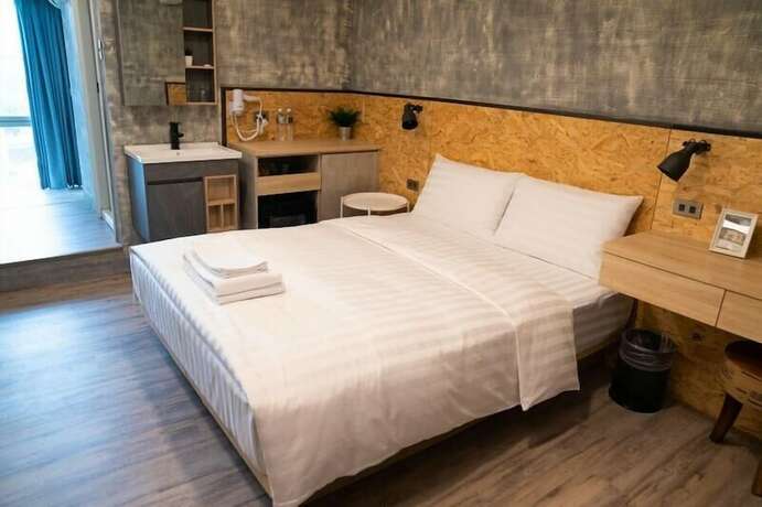 Imagen de la habitación del Hotel Tainanwow. Foto 20