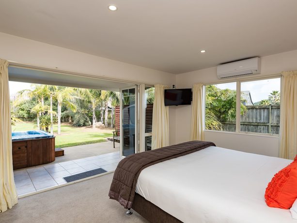 Imagen de la habitación del Hotel Taipa Beach Resort. Foto 19