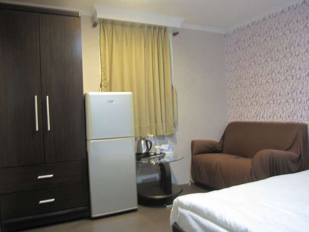 Imagen de la habitación del Hotel Taipei Happy Home. Foto 4