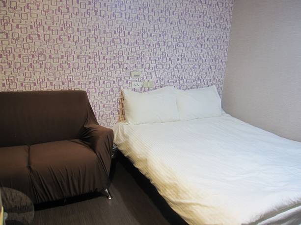Imagen de la habitación del Hotel Taipei Happy Home. Foto 5