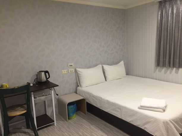 Imagen de la habitación del Hotel Taipei Happy Home. Foto 13