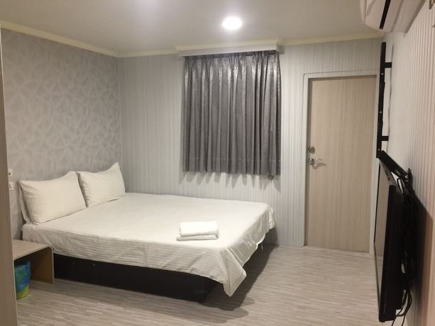 Imagen de la habitación del Hotel Taipei Happy Home. Foto 14