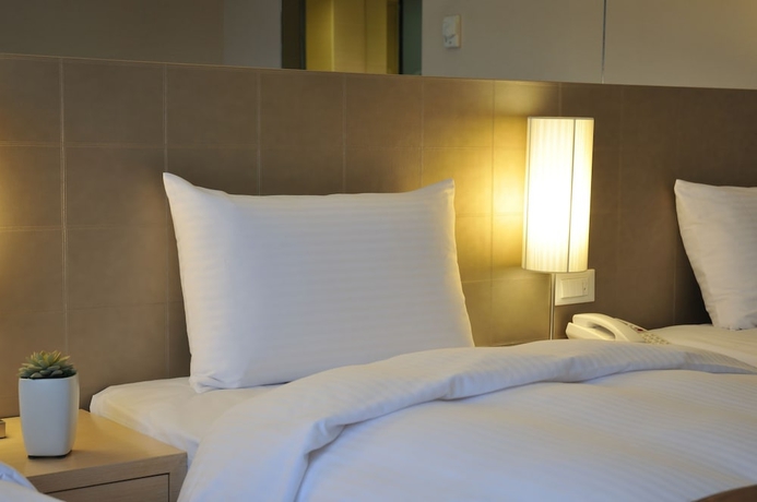 Imagen de la habitación del Hotel Taipei Orchard Park. Foto 11