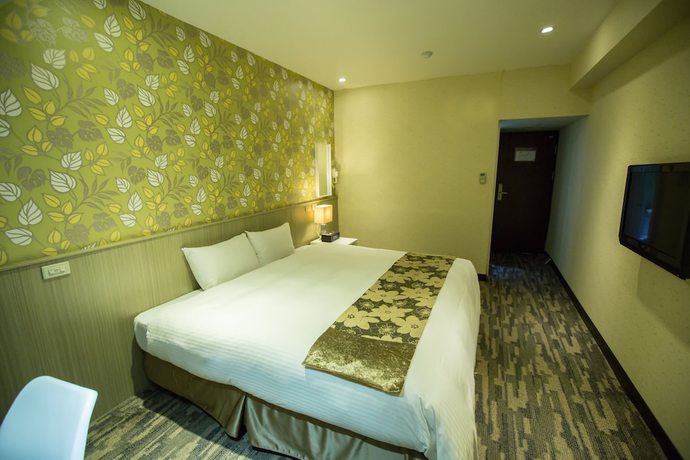 Imagen de la habitación del Hotel Taipei Toy. Foto 9