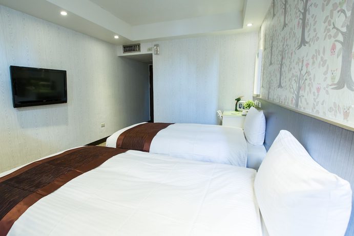Imagen de la habitación del Hotel Taipei Toy. Foto 12
