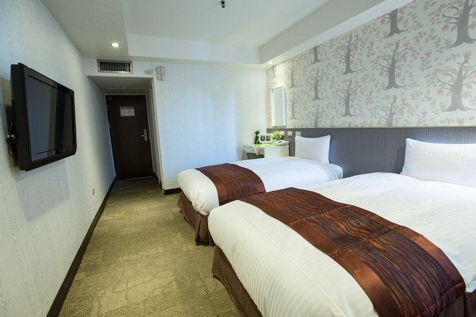 Imagen de la habitación del Hotel Taipei Toy. Foto 14