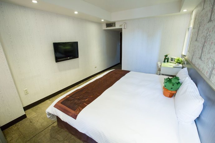 Imagen de la habitación del Hotel Taipei Toy. Foto 17