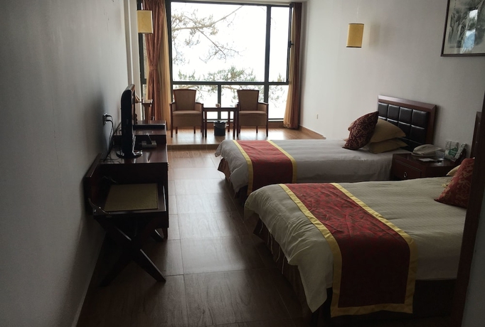 Imagen de la habitación del Hotel Taiping Lake Clove Garden. Foto 12