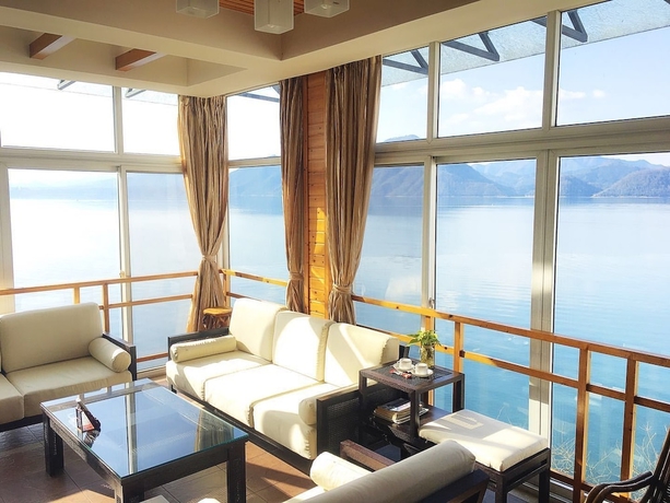 Imagen de la habitación del Hotel Taiping Lake Clove Garden. Foto 14