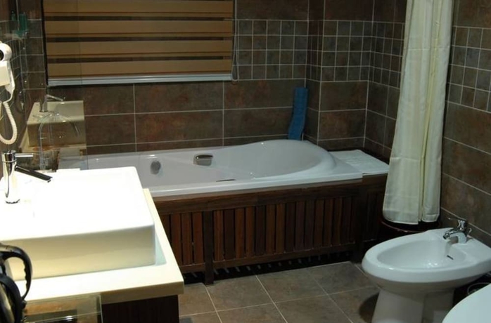 Imagen de la habitación del Hotel Taiping Lake Clove Garden. Foto 18