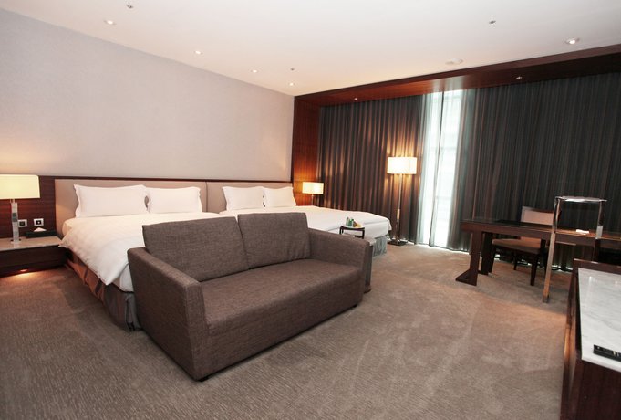 Imagen de la habitación del Hotel Taipung Suites. Foto 14