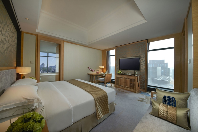 Imagen de la habitación del Hotel Taishan Blossom. Foto 15