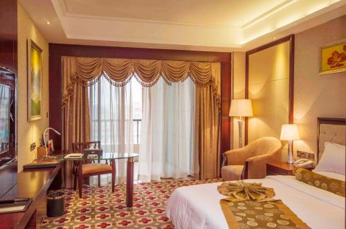 Imagen de la habitación del Hotel Taishan Jie'aosi International. Foto 3