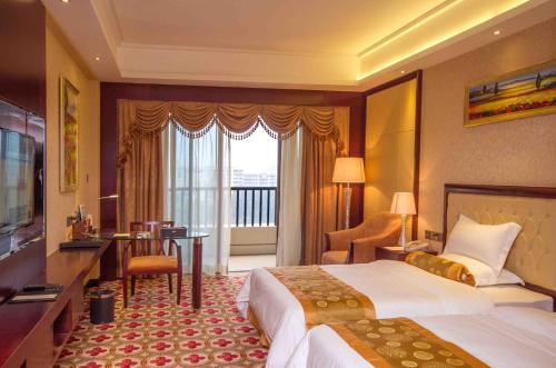 Imagen de la habitación del Hotel Taishan Jie'aosi International. Foto 6