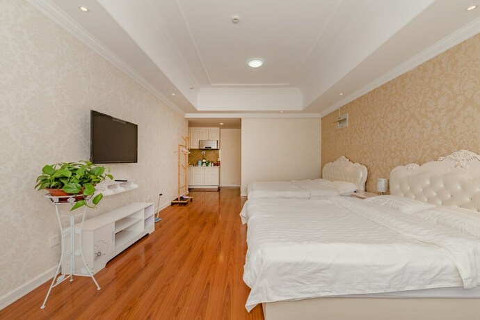 Imagen de la habitación del Hotel Taishan Shell Apartment. Foto 19