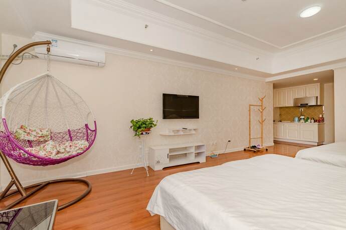 Imagen de la habitación del Hotel Taishan Shell Apartment. Foto 20