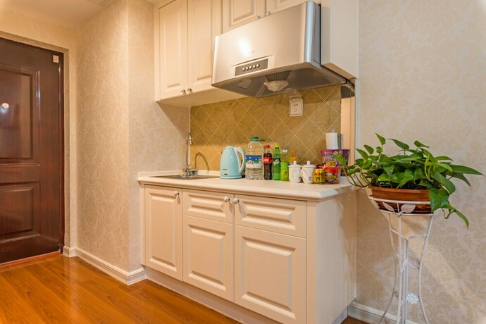 Imagen de la habitación del Hotel Taishan Shell Apartment. Foto 22