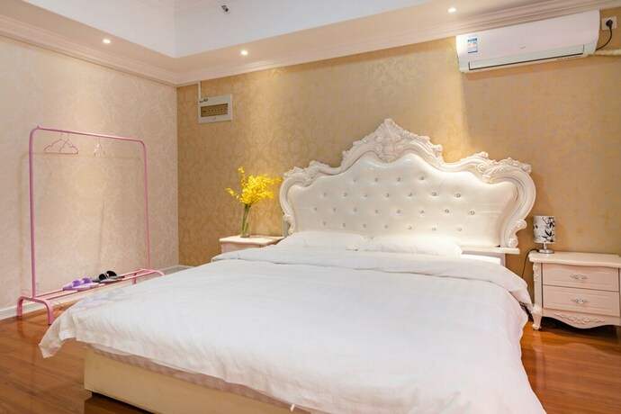 Imagen de la habitación del Hotel Taishan Shell Apartment. Foto 23