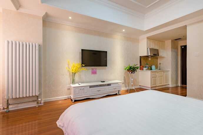 Imagen de la habitación del Hotel Taishan Shell Apartment. Foto 24