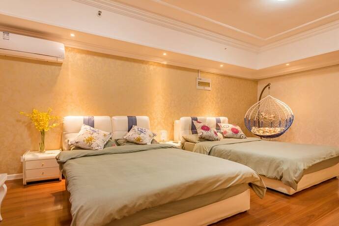 Imagen de la habitación del Hotel Taishan Shell Apartment. Foto 25