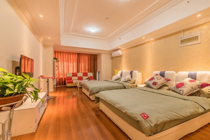 Imagen de la habitación del Hotel Taishan Shell Apartment. Foto 26