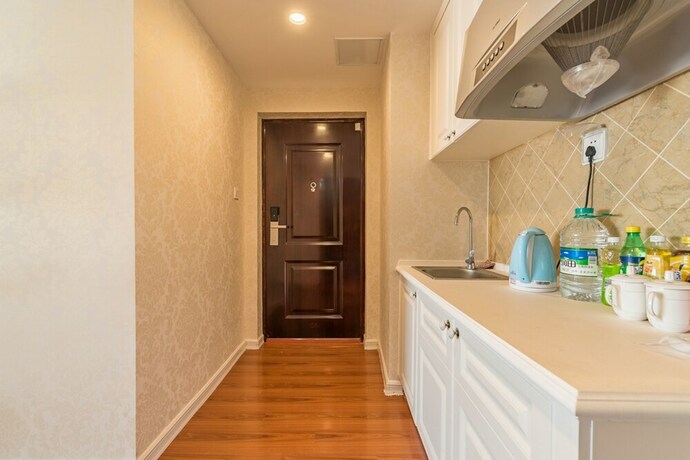Imagen de la habitación del Hotel Taishan Shell Apartment. Foto 28