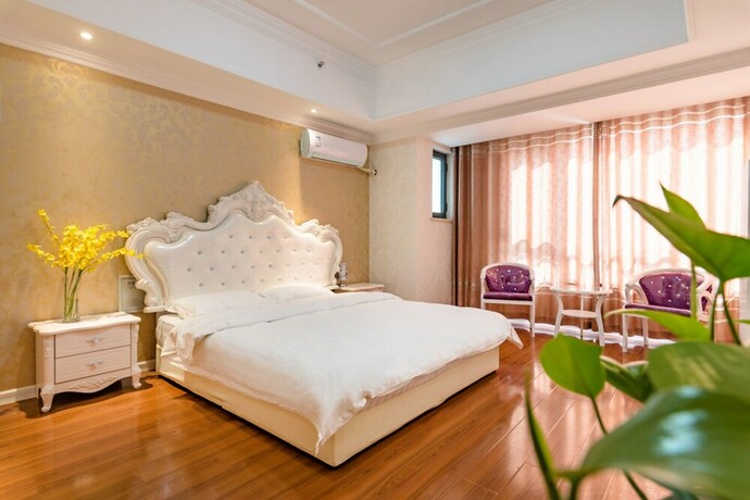 Imagen de la habitación del Hotel Taishan Shell Apartment. Foto 29