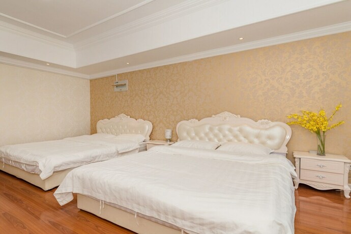Imagen de la habitación del Hotel Taishan Shell Apartment. Foto 31