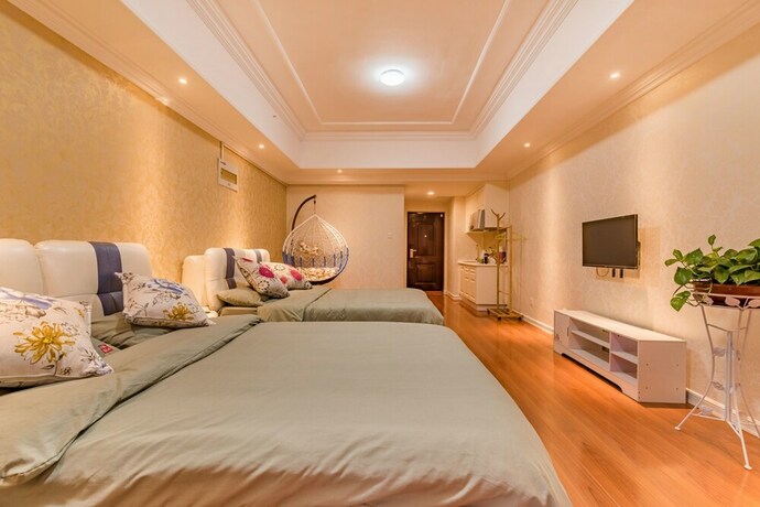 Imagen de la habitación del Hotel Taishan Shell Apartment. Foto 32