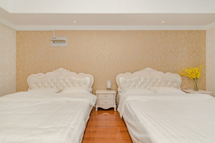 Imagen de la habitación del Hotel Taishan Shell Apartment. Foto 33
