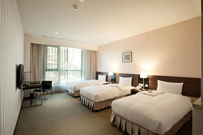 Imagen de la habitación del Hotel Taisugar Taipei. Foto 17