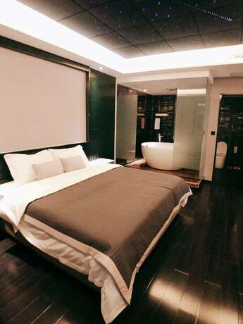 Imagen de la habitación del Hotel Taiyuan Strawberry Apartment Xuefu Br.. Foto 12