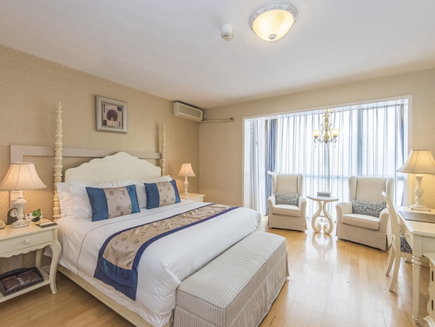 Imagen de la habitación del Hotel Taiyue Suites Beijing. Foto 4