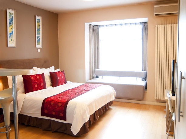 Imagen de la habitación del Hotel Taiyue Suites Beijing. Foto 5