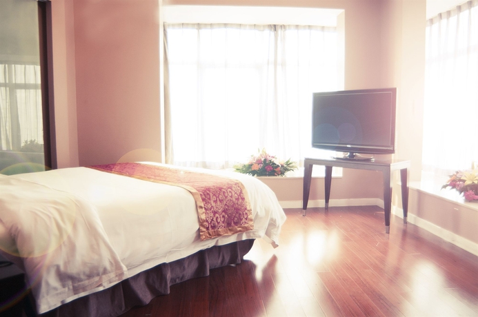 Imagen de la habitación del Hotel Taiyue Suites Beijing. Foto 6