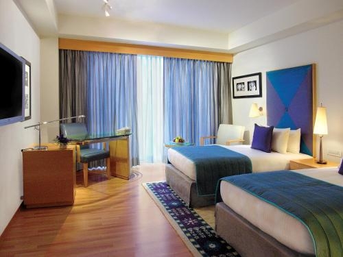 Imagen de la habitación del Hotel Taj Chandigarh. Foto 9