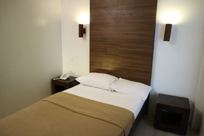 Imagen de la habitación del Hotel Taj Guesthouse. Foto 7