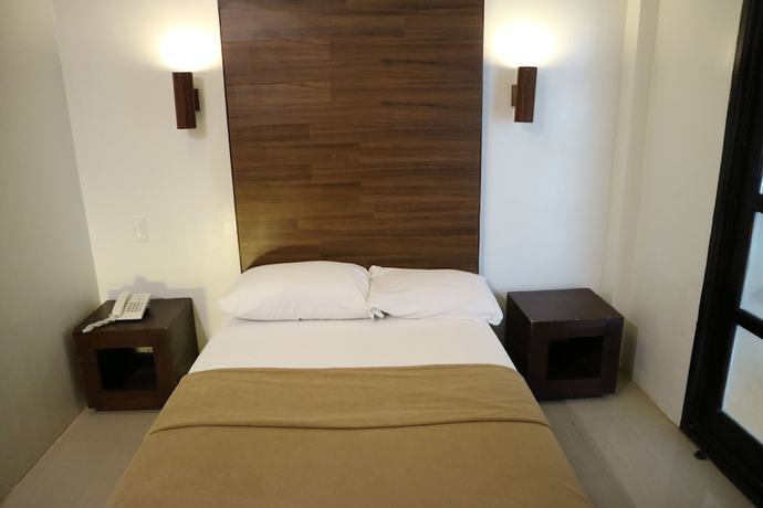 Imagen de la habitación del Hotel Taj Guesthouse. Foto 8