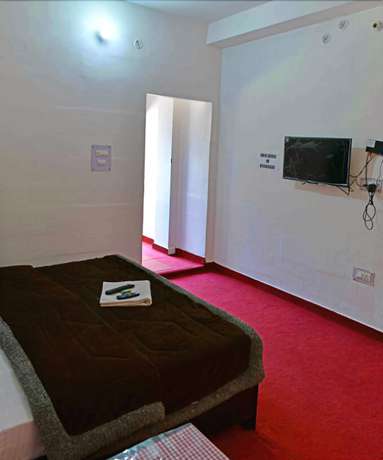 Imagen de la habitación del Hotel Taj Himalaya khirsu. Foto 11