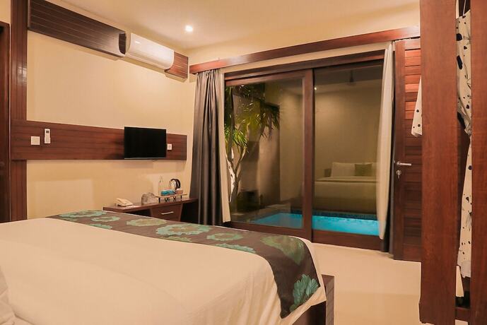 Imagen de la habitación del Hotel Taj Maza Sunset Villas. Foto 17