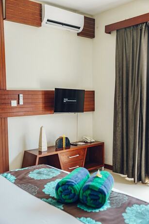 Imagen de la habitación del Hotel Taj Maza Sunset Villas. Foto 19