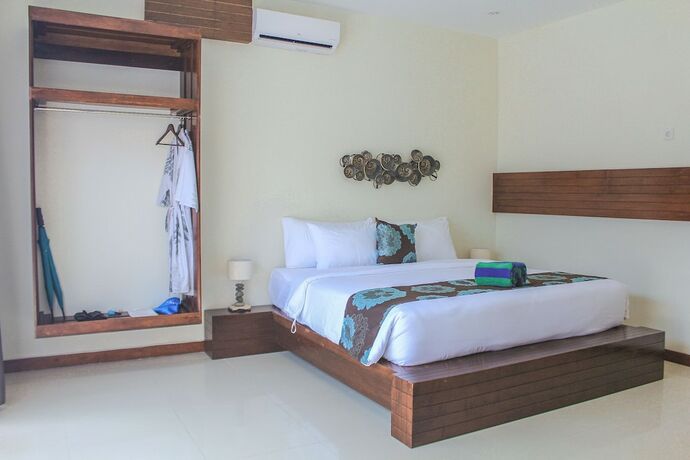 Imagen de la habitación del Hotel Taj Maza Sunset Villas. Foto 20